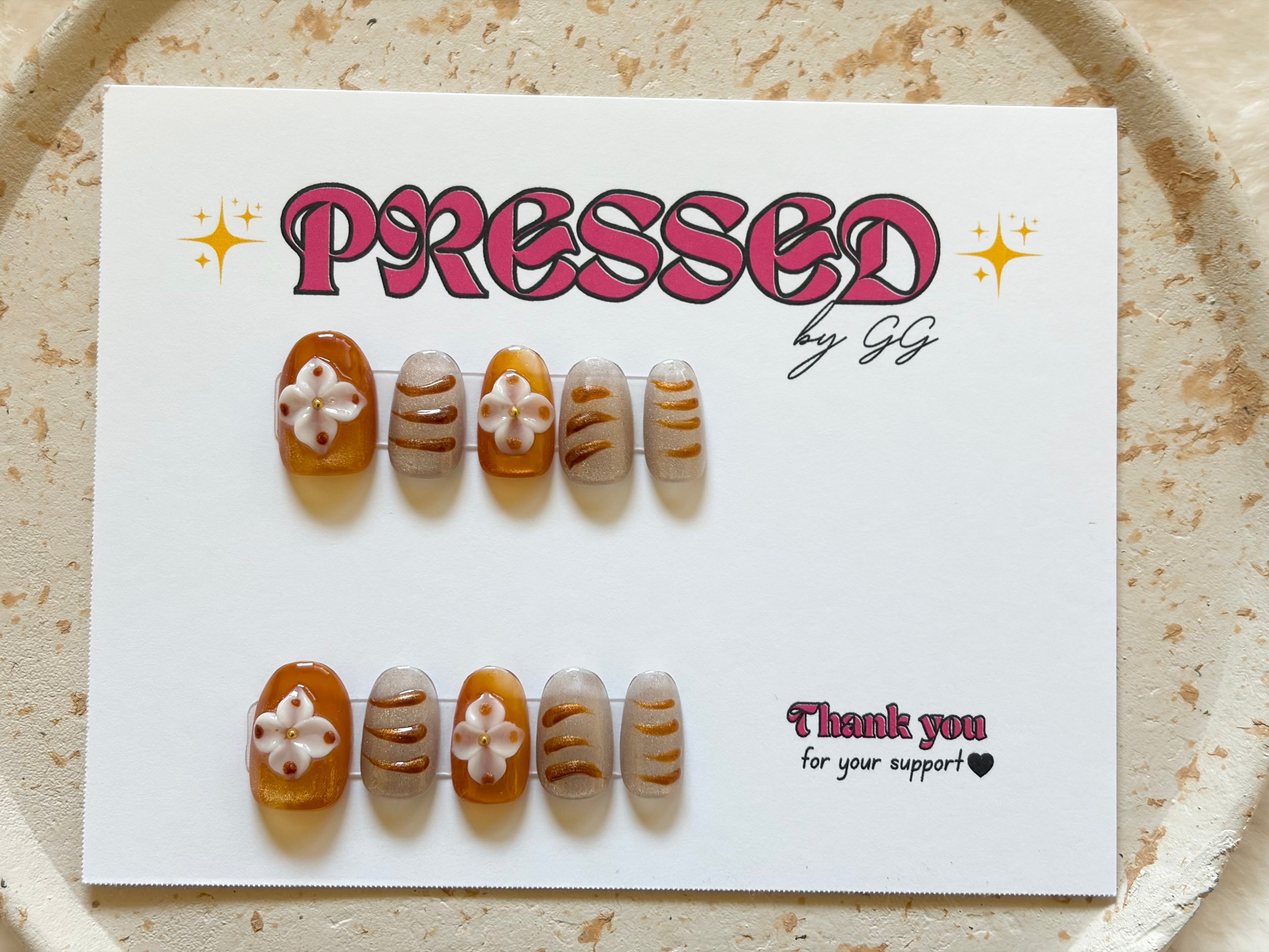 Short, almond shape $10