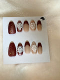 Short, almond, floral-$15