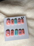 Short, square, multi-color- $10