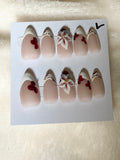 Long, floral, almond shape-$20