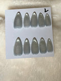 Long, almond, cat-eye-$10