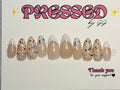Long, almond, floral-$25